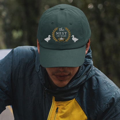 THE NEST ON WEST EMBROIDERED BADGE CLASSIC DAD HAT